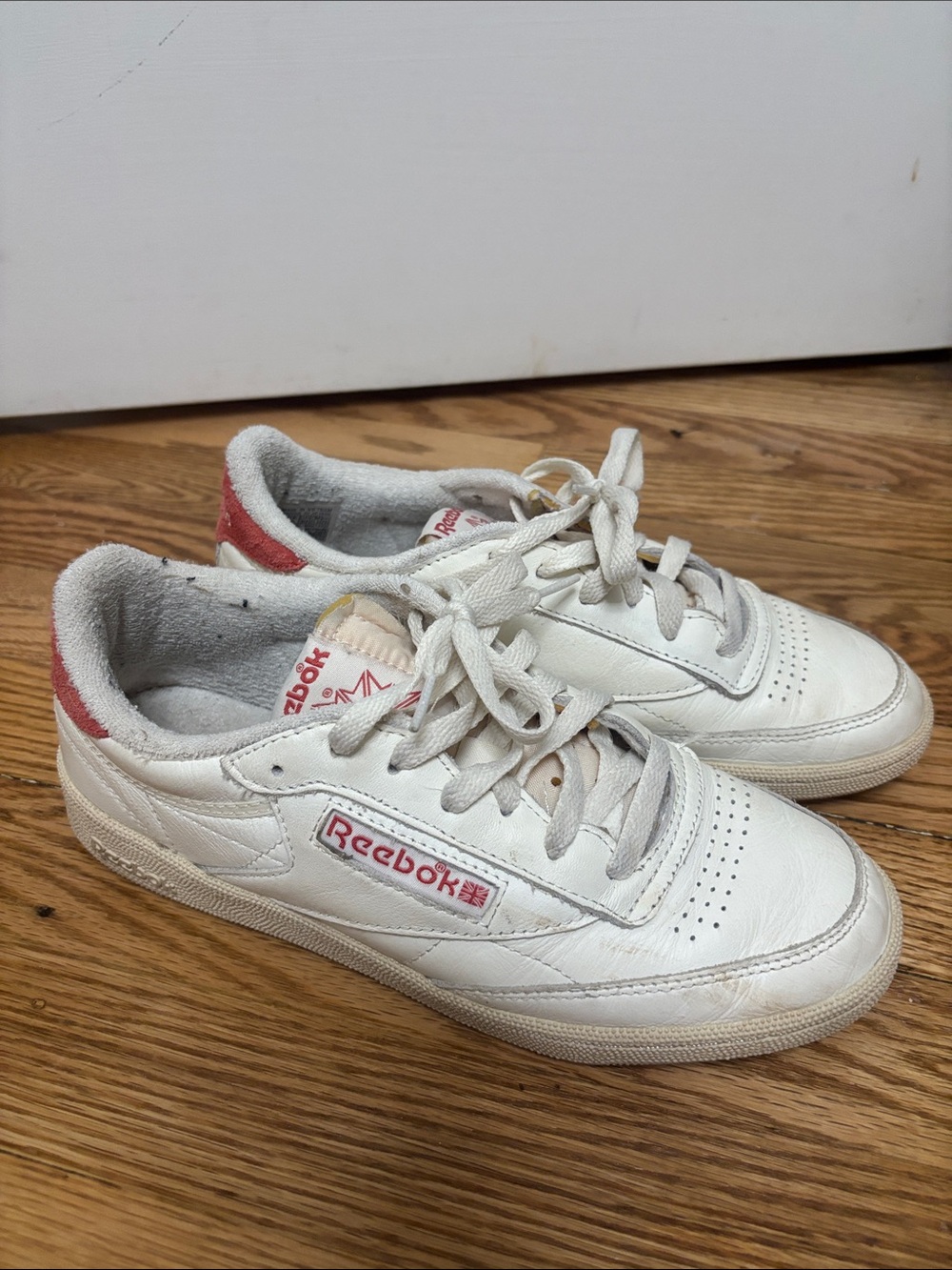 Reebok woman’s White and Red Leather Sneakers